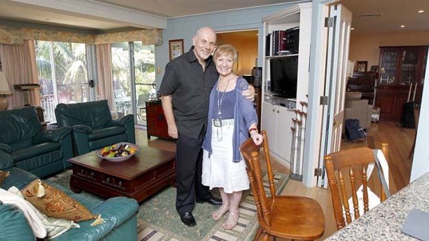 Happy where they are: Tom Jones and Miriam Guttman-Jones, who have not considered downsizing, inside their four-bedroom home in Bondi.