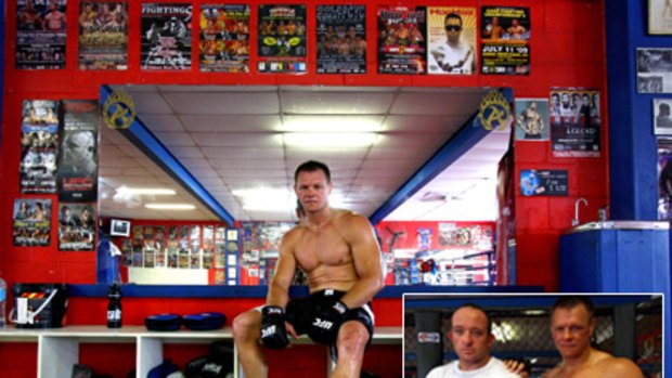 Ultimate Fighting Championship contender Chris Haseman at the Integrated Mixed Martial Arts gym at Stafford. Inset: Haseman with his trainer and operator of the gym, Dan Higgins (left).