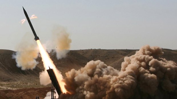 A short-range missile is test-launched at Qom, south of Tehran. Iran's nuclear ambitions need to be held in check by a united stand from the world's major powers, writes David Santoro.