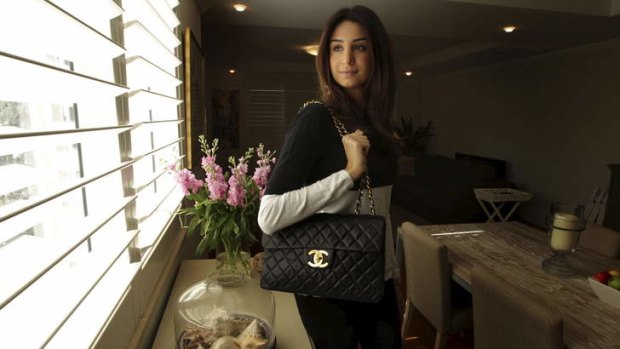 Luxe for less: Katie Lolas at home in Rose Bay with her Chanel handbag she bought for a ''bargain'' price.