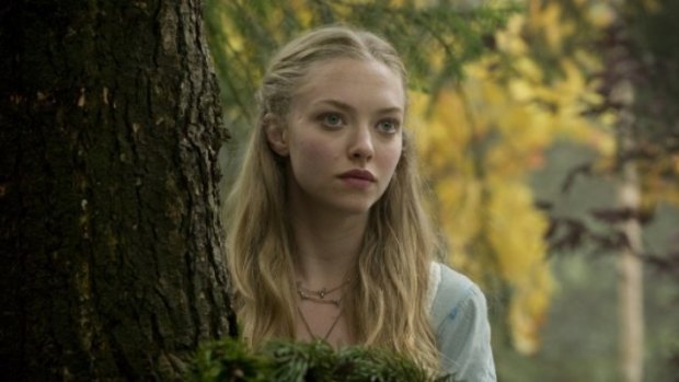 What big eyes you have: Amanda Seyfried flashes those famous peepers in the dour Red Riding Hood.