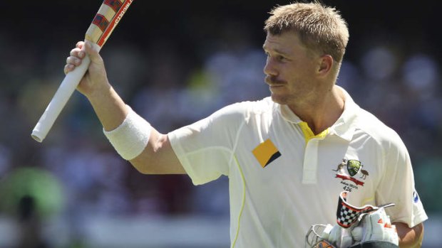 David Warner salutes the crowd after another good day's work.