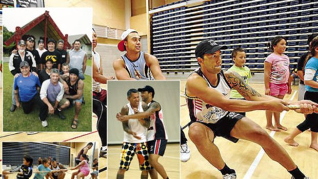 Father figures...Benji Marshall with his  10 'fathers', and helping the children during family reunion activities at the Te Rauparaha Arena.