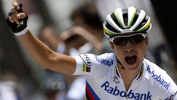 Dutch champion Marianne Vos celebrates after claiming the first edition of La Course by Le Tour de France in Paris on Sunday.