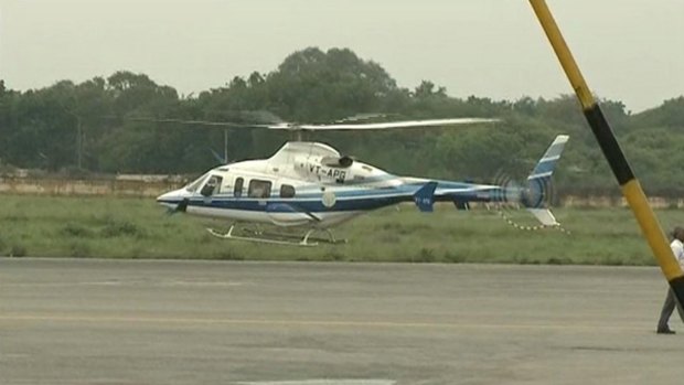 This photograph released by Telugu Television channel Sakshi TV shows a helicopter carrying Andhra Pradesh Chief Minister Y.S. Rajasekhara Reddy, taking off in Hyderabad, India.