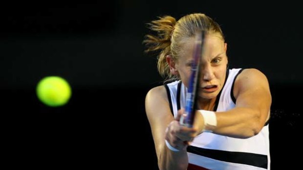 Jelena Dokic gets the ball back to Barbora Zahlavova Strycova in their second-round clash last night. Dokic made 42 unforced errors on the way to losing the match 7-6 (7-3), 6-1.