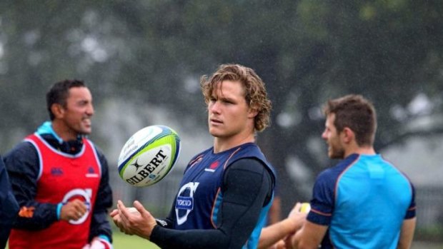 Reunion: Michael Hooper will be on the same field as Wallabies partner Scott Fardy again in Canberra on Saturday, but this time the breakaways will be on opposing sides.