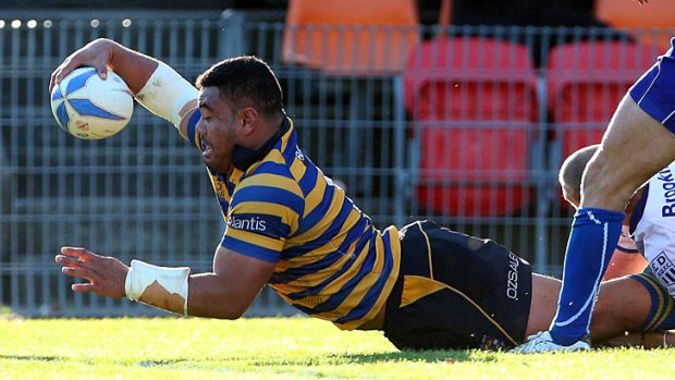 Tolu Latu barges over for a try in Sydney University's victory over Eastwood in the Sydney club rugby grand final.