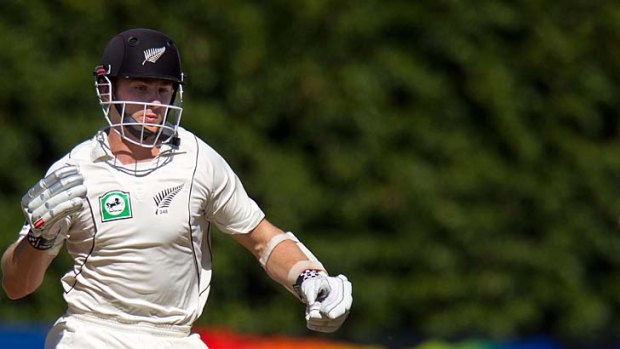 Kane Williamson loses his bat as he darts through for a sharp single on the final day of the third Test at the Basin Reserve in Wellington.