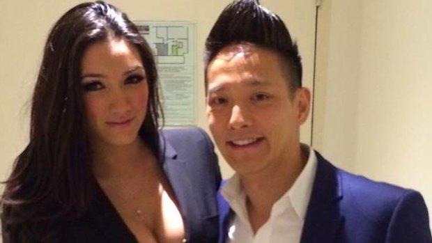 Eric Woo, pictured with an unnamed woman.