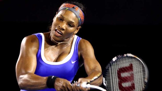 Fighting fit ... Serena Williams in full flight against Austria's Tamira Paszek.