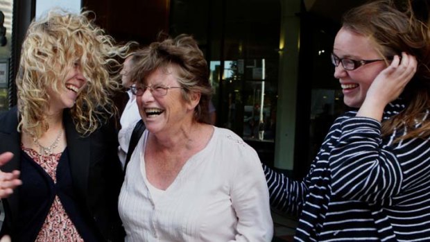 Vindicated ... Catherine Smith yesterday outside Downing Centre District Court after her husband Kevin Smith was sentenced to at least 10 years in jail.