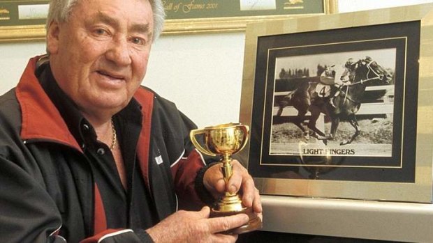 Roy Higgins with the replica of the Melbourne Cup he won on Light Fingers in 1965.