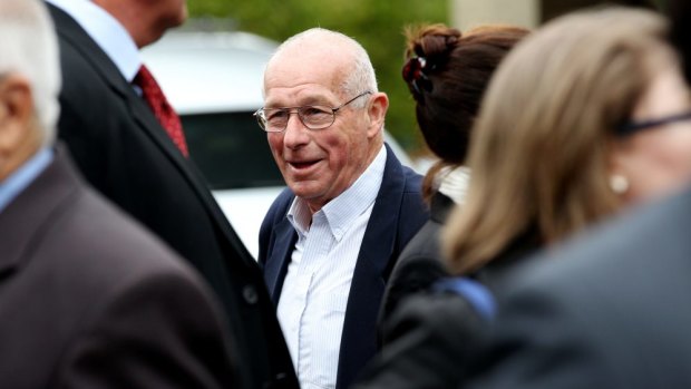Alan Jones has a soft spot for hard nut Roger Rogerson (pictured smiling at a funeral).