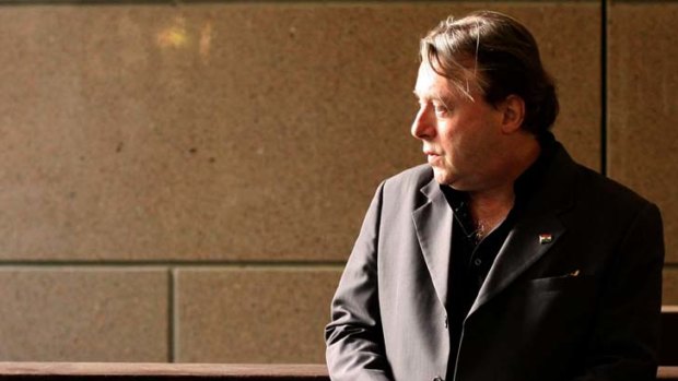 Atheist author Christopher Hitchens battles cancer but ready to