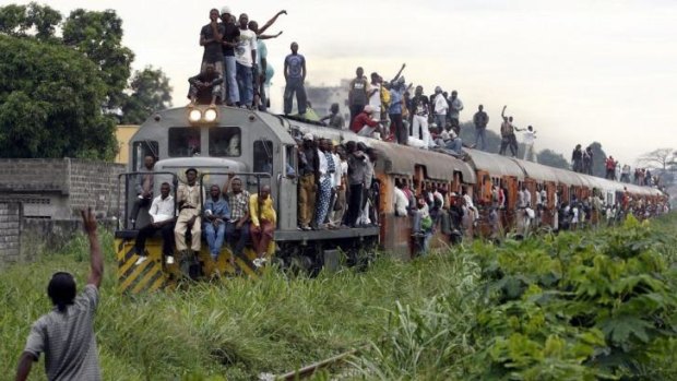 This picture taken on November 8, 2006 shows a commuter train carrying Congolese people in Kinshasa. At least 57 people were killed when a train derailed in the southeast of the country on Tuesday.