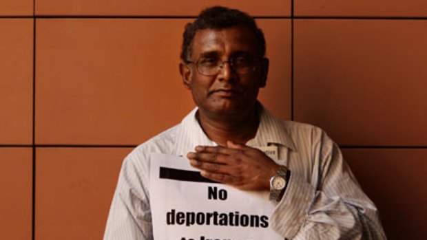 Let them in ... a Sydney-based Tamil, Balan Suthan, 54, of Seven Hills, was among about 100 protesters who turned out in the city yesterday.