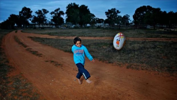 Kicking for glory: Dale Harris from Wilcannia plays with the local club.