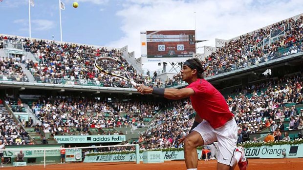 King of clay ... Rafael Nadal put on a masterclass against compatriot David Ferrer.