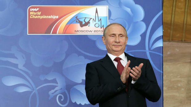 Under fire: Russian President Vladimir Putin during the opening ceremony of the IAAF World Athletics Championships in Moscow.