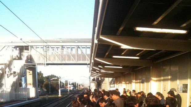 Jam packed ... Train passengers wait at Laverton station this morning after a blackout forced the cancellation of services.