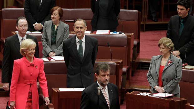 Governor-General Quentin Bryce is escorted into the Senate Chamber, passing Greens Leader Bob Brown and Greens Deputy Leader Christine Milne at Parliament House.