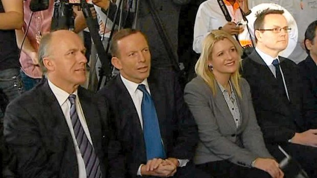 Video Still of Tony Abbott  with Alastair Furnival (highlighted) at the Cadbury Factory.