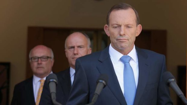 Prime Minister Tony Abbott with Senator George Brandis and Senator Eric Abetz.