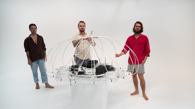 Kristian Laemmle-Ruff, Chris Conole and James Hebblethwaite of creative studio John Fish with their light and sound sculpture <i>Medusa</i>.
