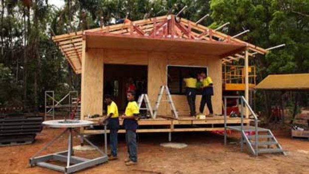 Darwin High School students build the house.