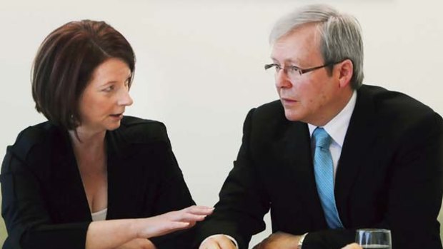 No hard feelings... Prime Minister Julia Gillard chats with the man she deposed, Kevin Rudd.