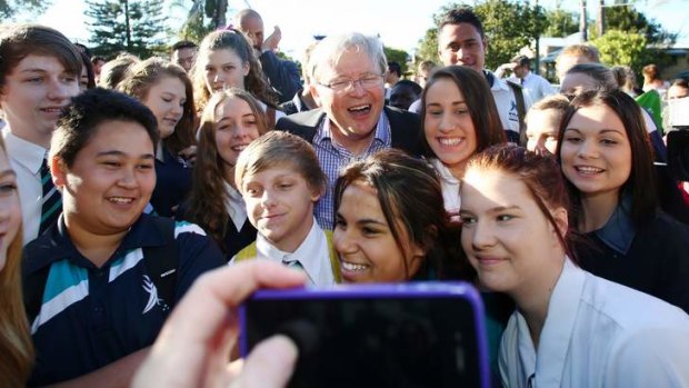 Appealing to people power: Prime Minister Kevin Rudd outside Nyanda State High School in the seat of Moreton.