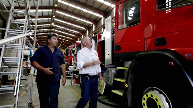 Paul Bastian, National Secretary of the AMWU (right), fears Holden will not wait for a government report to make a decision on its future.