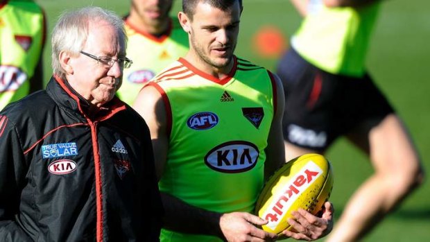 Dr. Bruce Reid with Brent Stanton at Essendon training in June.