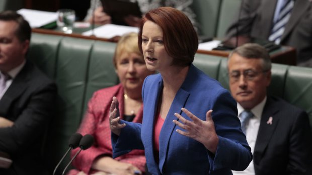 Prime Minister Julia Gillard replies to Opposition Leader Tony Abbott's motion to dismiss the Speaker Peter Slipper at Parliament House in Canberra on Tuesday. Photo: Andrew Meares