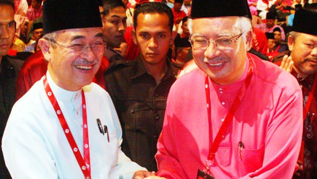 Abdullah Ahmad Badawi and Najib Razak.