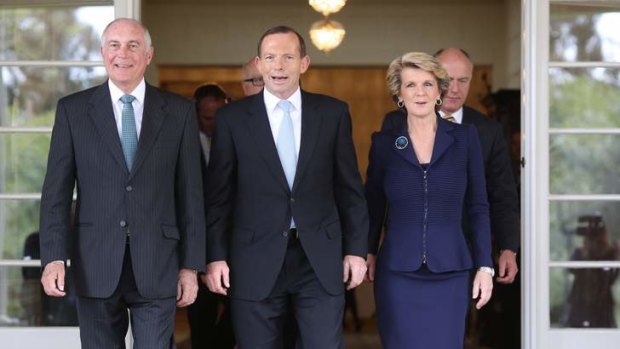 In power: Warren Truss, Tony Abbott and Julie Bishop at Government House in Canberra on Wednesday.