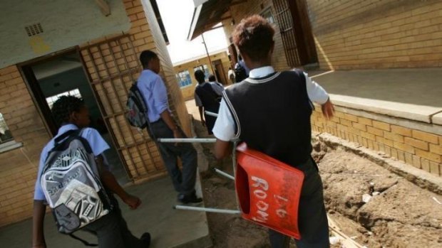 Corporal punishment banned in 1996 ... Students at a high school in the heart of South Africa's biggest township Soweto, outside Johannesburg, on January 16, 2008.