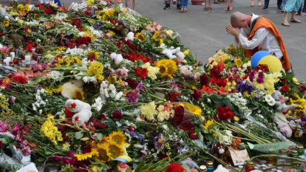 A sea of flowers has emerged outside the Dutch embassy in Kiev. Nearly 200 MH17 victims were from the Netherlands.