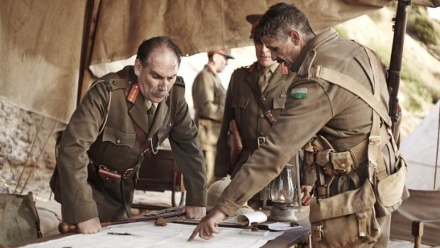 Mapped out: Sergeant Harry Perceval (Matt Nable) explains what they have found inland to Major General Sir William Throsby Bridges (Colin Moody) at Anzac Beach HQ.