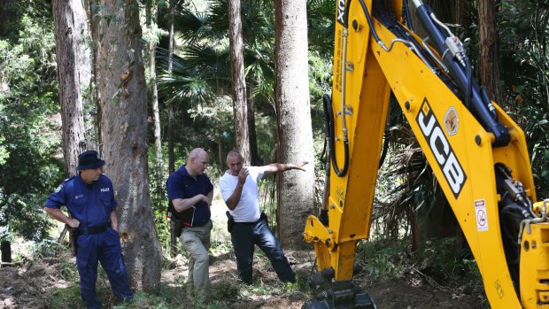 Police search an area of the Royal National Park for the body of Matthew Leveson. 