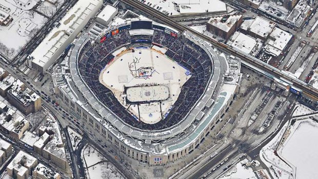 Aerial view of the 2014 Coors Light NHL Stadium Series match between the New York Rangers and the New Jersey Devils at Yankee Stadium.