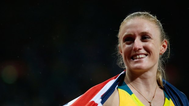 Sweet success: Sally Pearson celebrates her gold medal at the London Olympic Games.