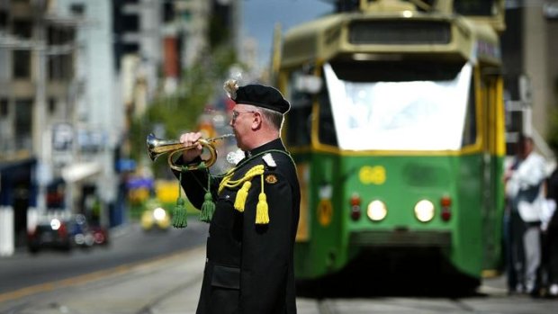 John Mansfield from 4/19 Prince of Wales Light Horse Regimental Band plays The Last Post.
