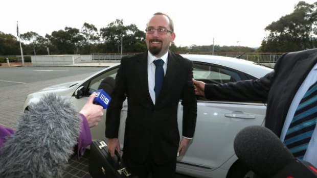 Senator-elect Ricky Muir, from the Australian Motoring Enthusiasts Party, arrives at Parliament House in Canberra.