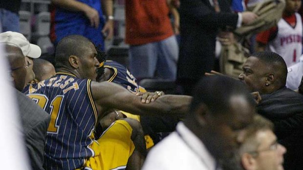 Flashback ... Ron Artest gets stuck in in 2004.