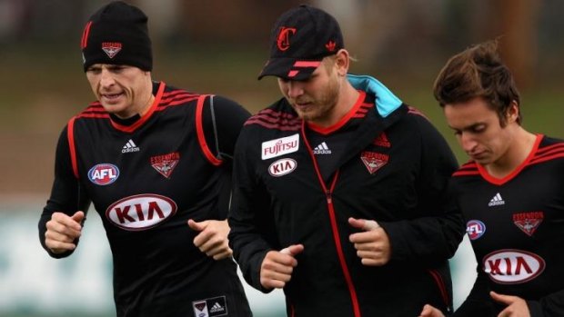 Brendon Goddard (left) with Michael Hurley at training on Tuesday.