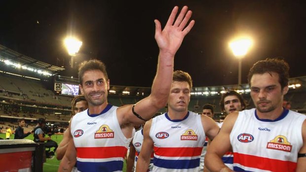 The Bulldogs leave the MCG after their first win of the season against Melbourne.