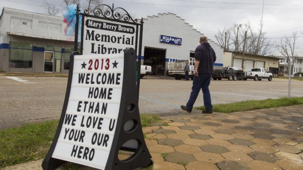 A sign in support of five-year-old Ethan, held hostage for six days, in Midland City after his rescue.