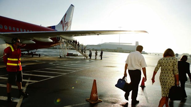 Virgin Australia has blamed its loss on capacity growth, weaker economic conditions and the carbon tax.